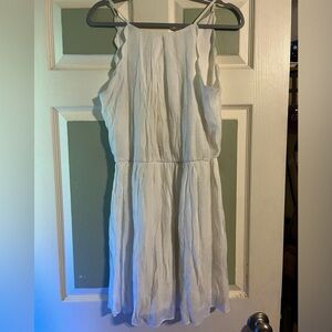 I don’t know the brand but it’s a really cute dress. Size M